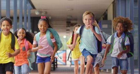 Excited Kids Running through School Hallway - Download Free Stock Images Pikwizard.com