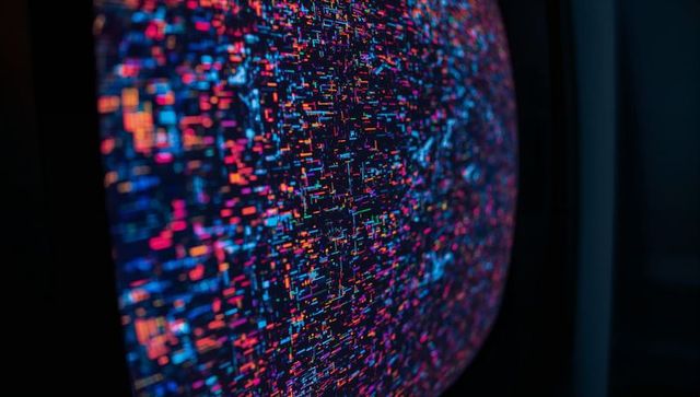 Vivid Abstract Pixels on Curved LED Screen in Dimly Lit Tech Lab