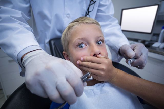 Scared Child at Dentist Office During Check-Up - Download Free Stock Photos Pikwizard.com