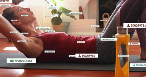 Woman embedding with social media while practicing yoga