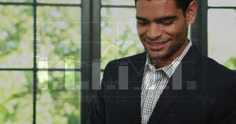 Businessman reviewing interactive data overlays at office window, smiling with confidence