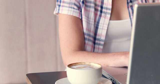 Person Working at Coffee Shop with Laptop and Coffee - Download Free Stock Images Pikwizard.com