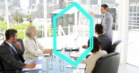 Confident Executive Using Digital Presentation in Modern Meeting Room