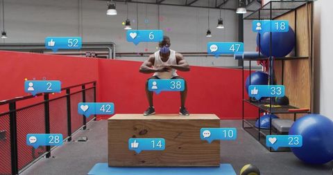 Athlete wearing face mask performing box squat amid social media notification icons