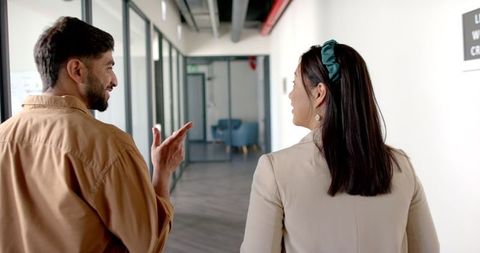 Colleagues Engaged in Office Conversation