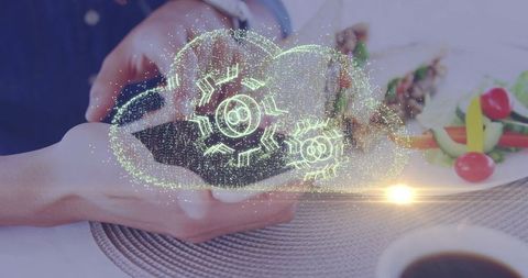 Holographic cloud projection over dining table with smartphone