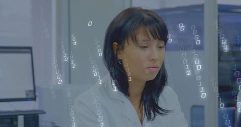 Asian scientist in lab processing binary data with technology innovation