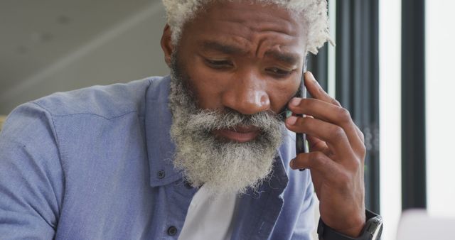 Image of african american senior man using smartphone - Download Free Stock Photos Pikwizard.com