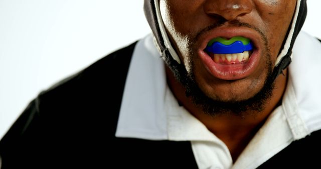 Close-Up Determined Rugby Player Wearing Mouthguard - Download Free Stock Images Pikwizard.com