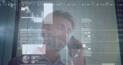 Businessman Analyzing Data with Financial Graphics Overlay - Download Free Stock Images Pikwizard.com