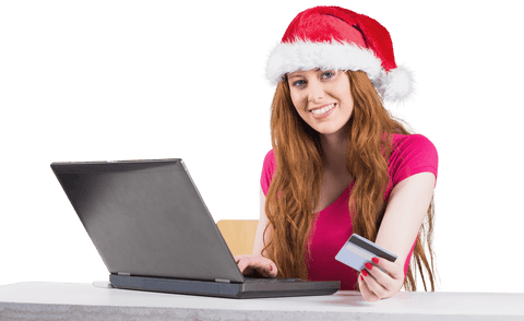Festive Redhead Shopping Online with Laptop on Transparent Background