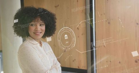 Confident professional analyzing futuristic holographic data