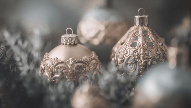 Champagne Gold Ornate Christmas Baubles on Cozy Tinsel with Soft Bokeh Glow