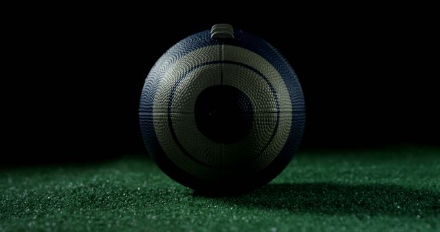 Rugby Ball on Grass Field In Dramatic Lighting - Download Free Stock Images Pikwizard.com