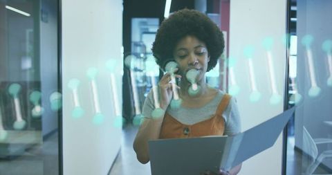 Businesswoman Multitasking with DNA Overlay in Modern Office