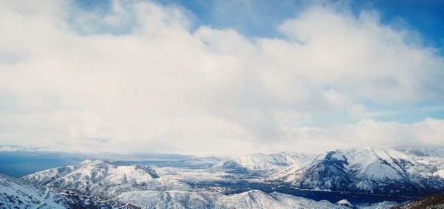 Scenic Snowy Mountain Landscape with Cloudy Sky - Download Free Stock Photos Pikwizard.com