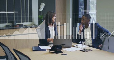 Business professionals evaluating interactive digital data