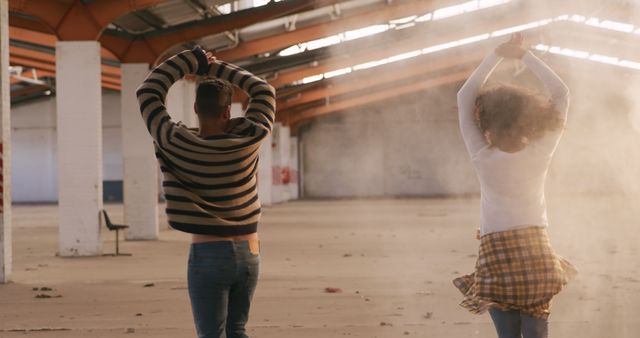 Couple Dancing in Dusty Warehouse - Download Free Stock Images Pikwizard.com