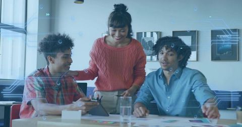 Creative Team Engaging in Design Collaboration with Digital Devices