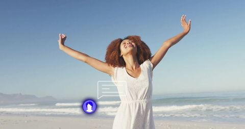 Joyful Woman Celebrating Freedom on Sandy Beachfront