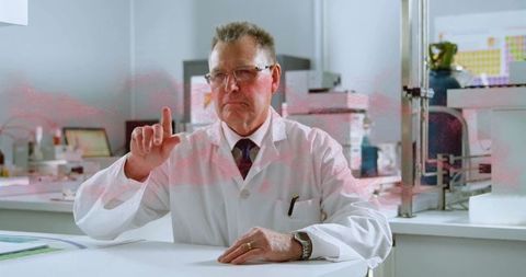 Senior scientist engaging in high-tech laboratory research