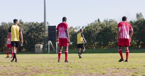 Diverse Soccer Team Gathering for Outdoor Practice