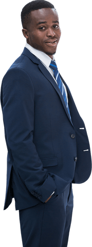 Confident young businessman smiling with hands in pockets on transparent background