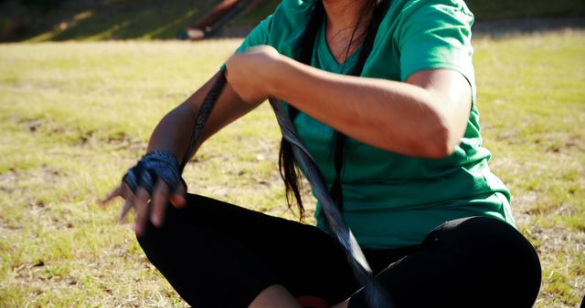 Person Coiling Rope Outdoors with Gloves - Download Free Stock Images Pikwizard.com