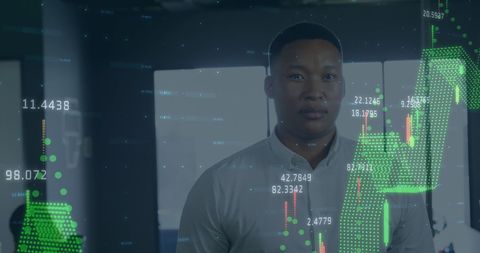 Analytical Business Professional Amidst Financial Graphs