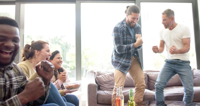 Excited Friends Celebrating in Living Room - Download Free Stock Images Pikwizard.com