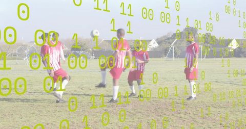 Soccer team heading ball with binary overlay representing sports analytics and teamwork
