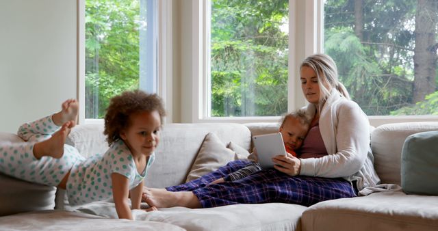 Mother Relaxing with Children in Cozy Living Room - Download Free Stock Images Pikwizard.com