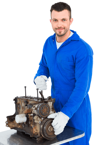 mechanic in blue coveralls repairing engine on transparent background - Download Free Stock Videos Pikwizard.com