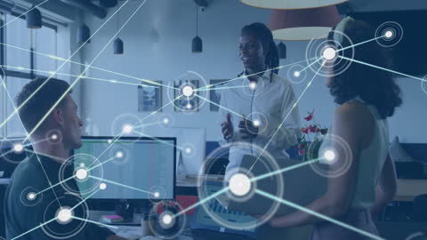 Diverse Team Engaging in Data-Driven Discussion in Office