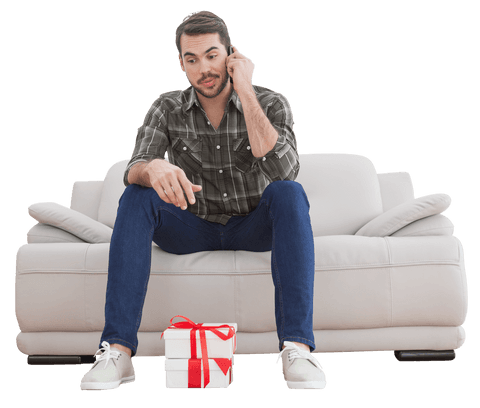 Man on Sofa Talking on Phone with Gift in Front, Transparent Background - Download Free Stock Videos Pikwizard.com