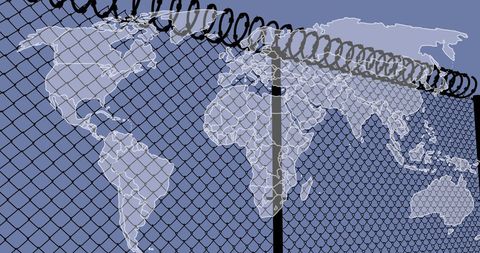 World map overlay on barrier fence illustrating global boundaries