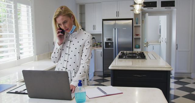 Young Woman Working from Home in Modern Kitchen with Mask - Download Free Stock Images Pikwizard.com