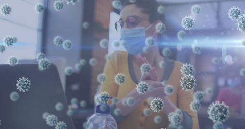Office safety during pandemic with mask and sanitizer