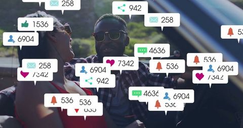 Couple Driving Convertible with Social Media Engagement Icons