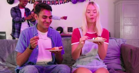 Diverse Friends Celebrating Birthday with Cake and Dance