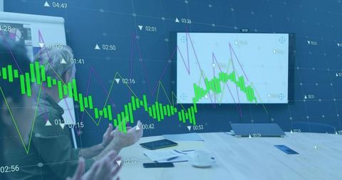 Senior businessman discussing financial charts in modern meeting room