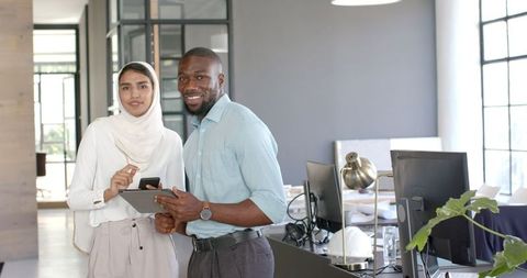 Multicultural Professionals Collaborating in Modern Office