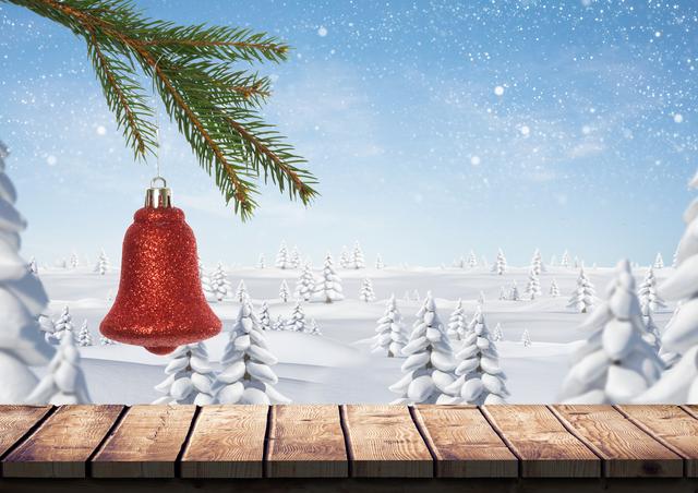 Digital composition of christmas bell hanging on branch of fir tree over wooden plank with snow covered trees in background