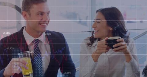 Business professionals networking break with graph overlay