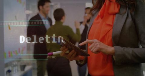 Modern Businesswoman Using Tablet in Collaborative Office Environment