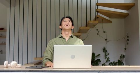 Home Office Productivity with Laptop and Headphones