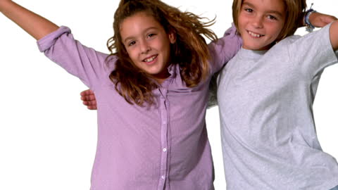 Happy Siblings Hugging with Joyful Expressions