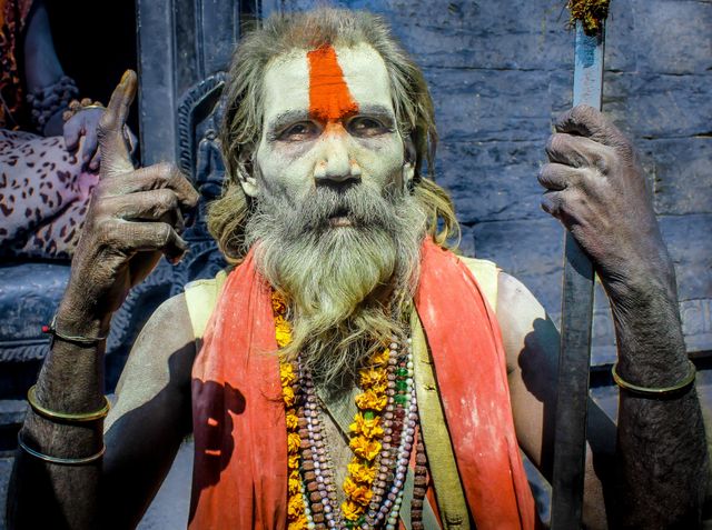 Hindu Holy Man with Orange Mark and Colorful Beads - Download Free Stock Photos Pikwizard.com