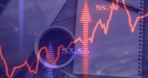 Stock market data graph over office desk with coffee cup