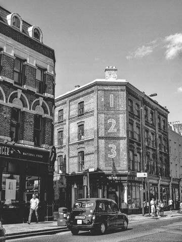 Historic Brick Building and Street Scene in Black and White - Download Free Stock Images Pikwizard.com